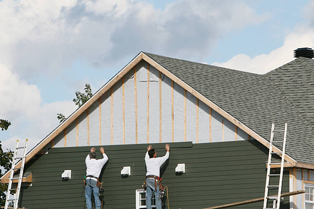 Professional Siding Installation technician working in Henrico, VA